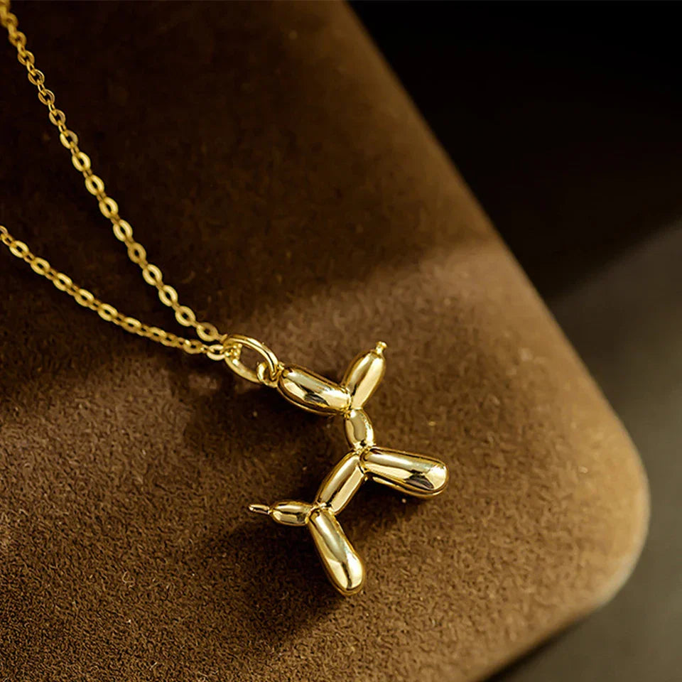 Collier avec un ballon en forme de chien - Or et argent