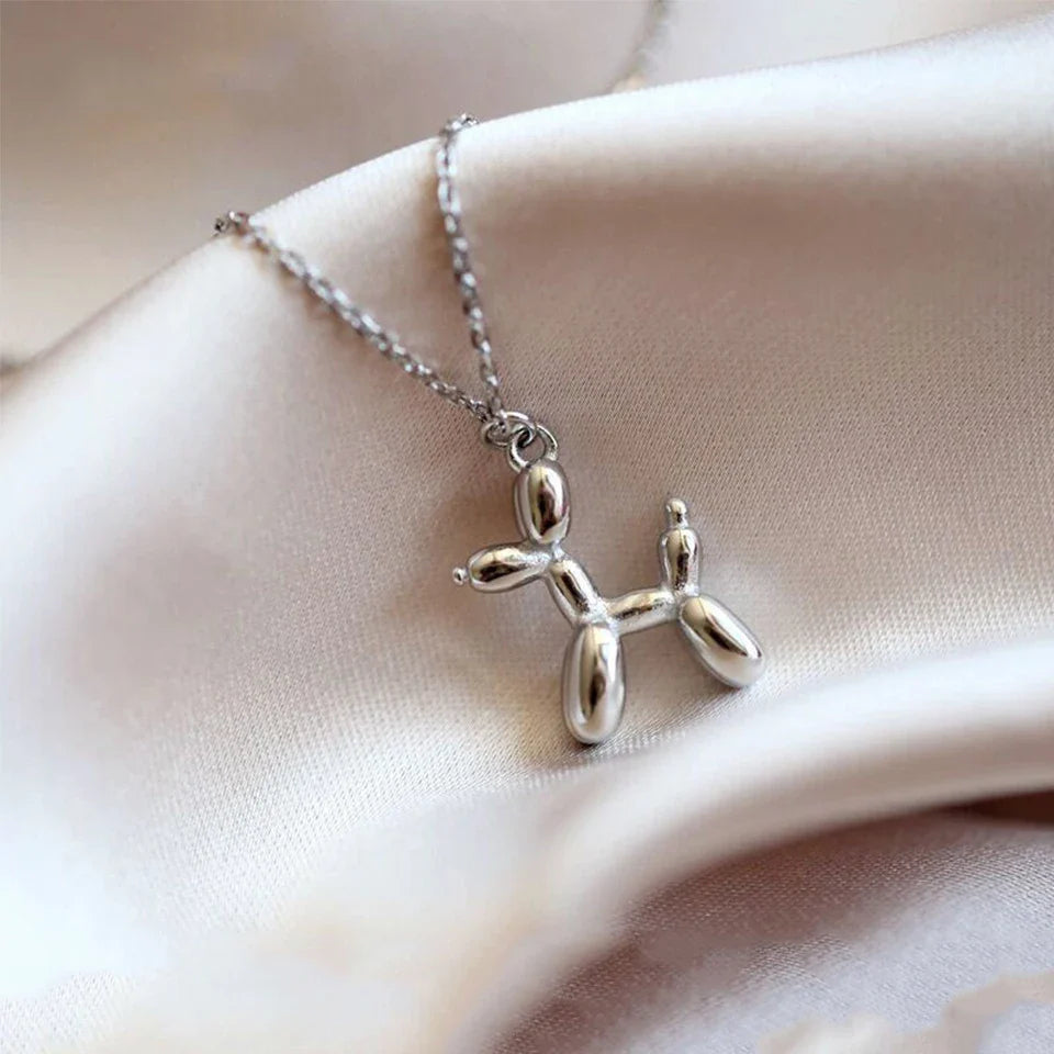 Collier avec un ballon en forme de chien - Or et argent